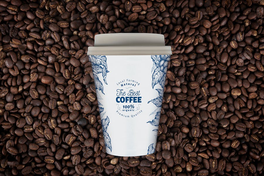 Coffee Cup On Beans Mockup