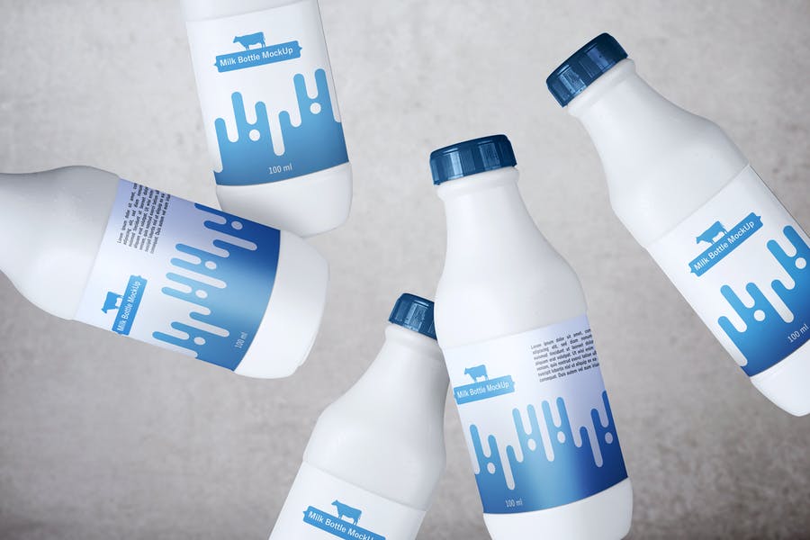 Realistic Milk Bottles Mockup